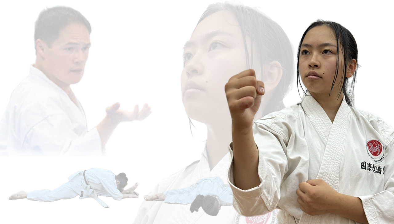 Focused young woman executing a powerful karate punch during adult class training
